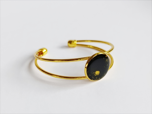 Náramek černý se zlatým práškem
